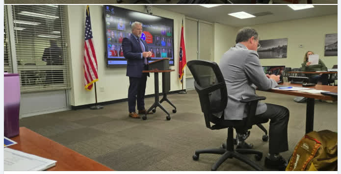 Board of Education members listening to Judge Eckel's presentation